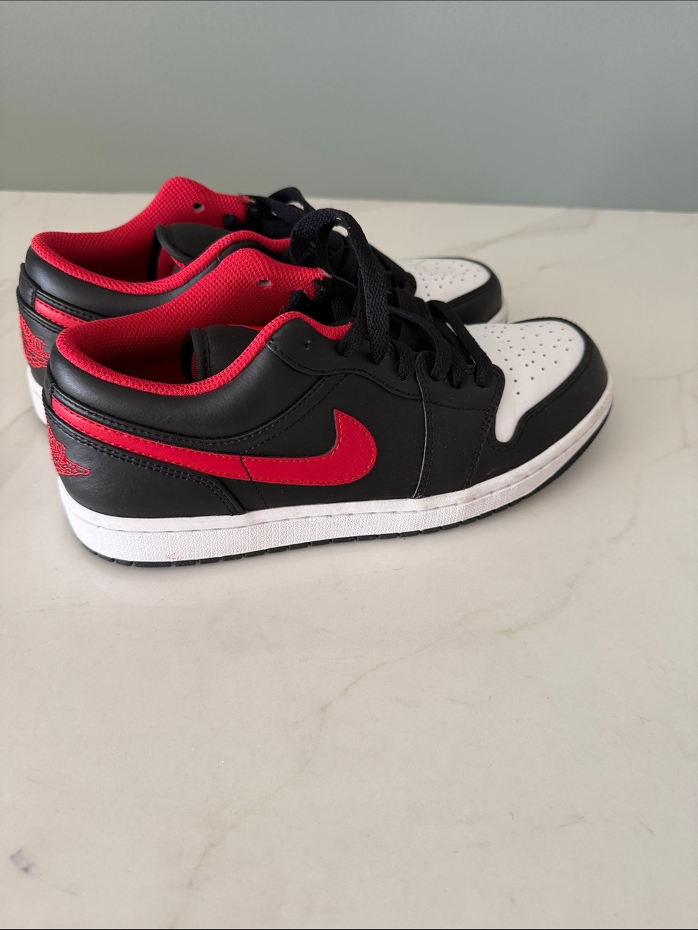 Jordan men’s Black, White & Red Low-Top Sneakers